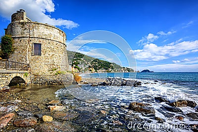 Historical Saracen tower in Alassio, resort town on Riviera, Italy Stock Photo