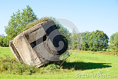 Historically concrete remains of the Second World War at field. Stock Photo