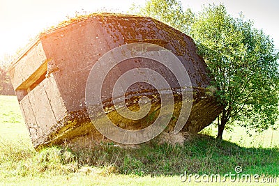 Historically concrete remains of the Second World War at field. Stock Photo