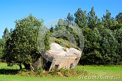 Historically concrete remains of the Second World War at field. Stock Photo