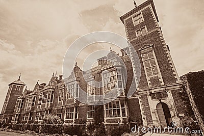 History of Architecture. Vintage toned typical historic English manor house Stock Photo