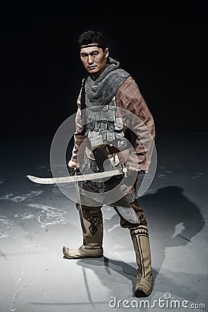 History warrior standing with two swords Stock Photo
