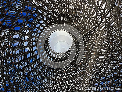 The Hive in Kew Gardens with visible sun rays - London, United Kingdom Editorial Stock Photo