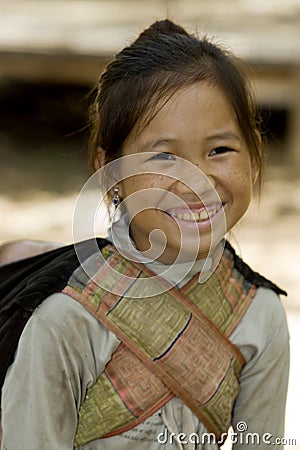 Hmong girl with brother, Laos Stock Photo