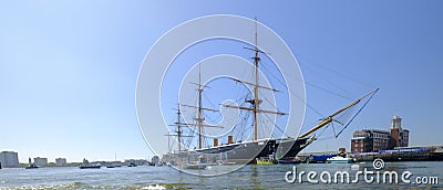 HMS Warrior (1862) - the first British ironclad battleship built for the Royal Navy - in spring afternoon light with slow shutter Editorial Stock Photo