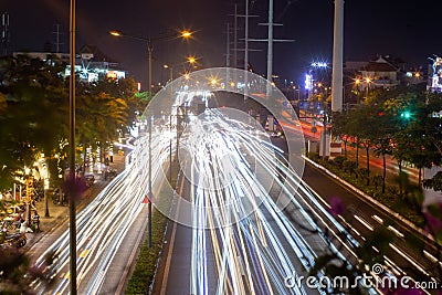 Ho Chi Minh City, Vietnam - April 23 2023: Timelapse exposure photo on pedestrian Bridge, Ho Chi Minh City Editorial Stock Photo