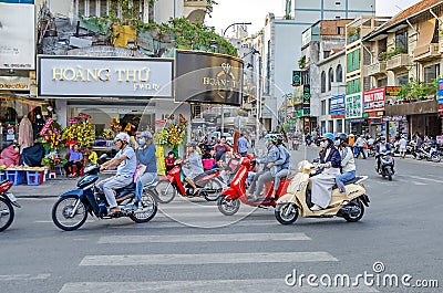 Typical intersection of Vietnamese streets with a lot of mopeds Editorial Stock Photo