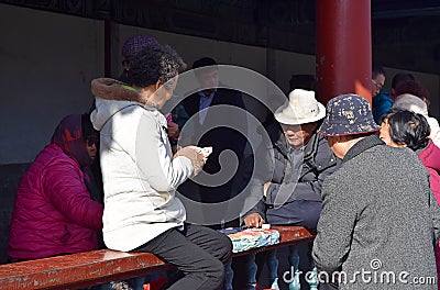 Ho Chi Minh City, Vietnam, March 30 2019: Vietnamese play card game on the street Editorial Stock Photo