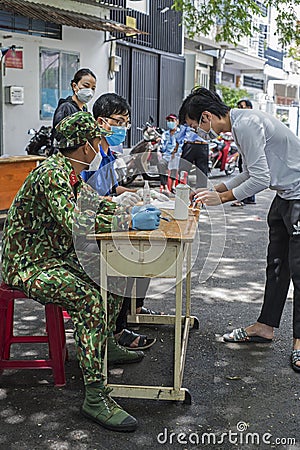 Vietnamese army delivers free large bags of rice during the 247 full curfew Editorial Stock Photo