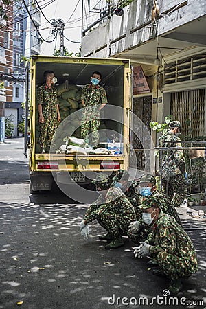 Vietnamese army delivers free large bags of rice during the 247 full curfew Editorial Stock Photo