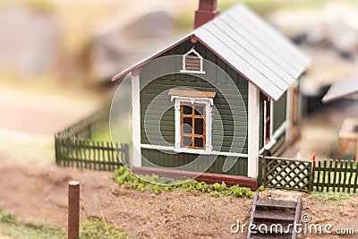 Hobby model small green house with a window. Stock Photo