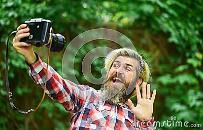 Hobby and professional occupation. Photographer and vintage camera. Man with retro camera. Photography in modern life Stock Photo