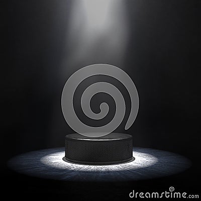 Hockey Background. A Hockey Puck on an Ice Surface in a Dark Space with Light Smoke or Fog Illuminated by a Spotlight. Stock Photo