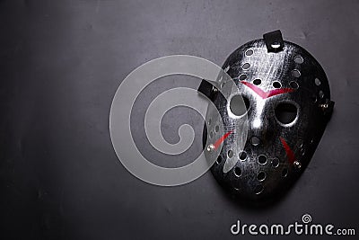 Hockey mask of serial killer isolated on black Stock Photo