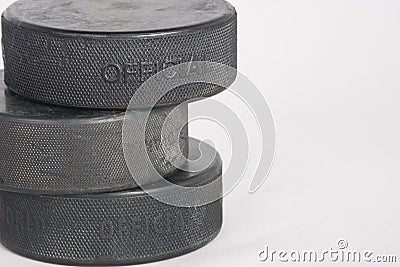 Hockey puck stack Stock Photo