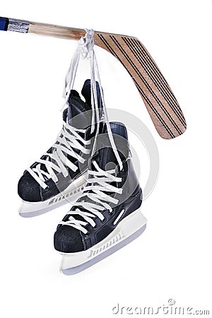 Hockey skates and stick Stock Photo