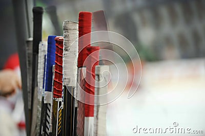 Hockey sticks near the locker room before the game Stock Photo
