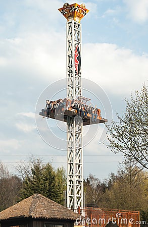 Free fall tower in amusement park. Extreme attraction Editorial Stock Photo