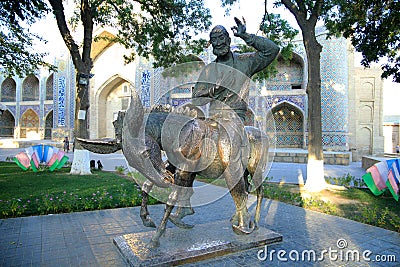 Hodja Nasreddin on his favorite donkey in Bukhara Editorial Stock Photo