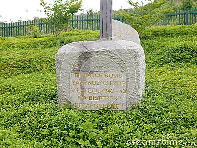 HODONIN KUNSTATU, CZECH REPUBLIC, APRIL 10, 2023: Cross memorial concentration camp people tourist crucifix labour Gypsy Editorial Stock Photo