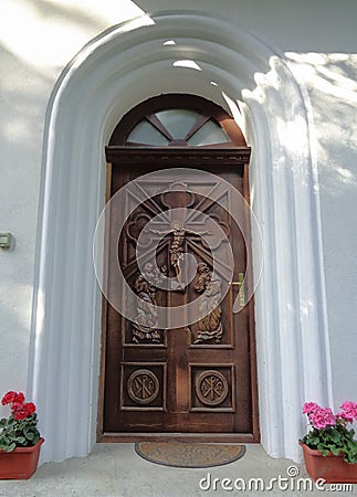 Hodos-Bodrog Monastery -carved wood door - Iisus on the cross Stock Photo