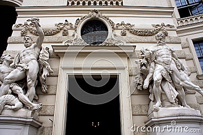 Hofburg residence and greek style statues Stock Photo