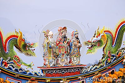 Hok Lok Siu 3 gods symbolizing the 3 auspiciousness of China And the dragon statue in chinese temple Three Chinese god Stock Photo