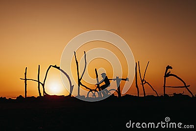 Hokitika Sign at sunset in Hokitika, New Zealand Stock Photo