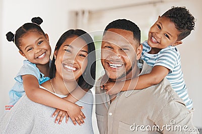 Hold on forever our little darlings. Portrait of a beautiful young family bonding while spending time together at home. Stock Photo