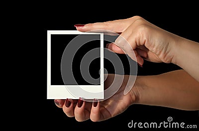 Holding blank polaroid - deep black background #2 Stock Photo