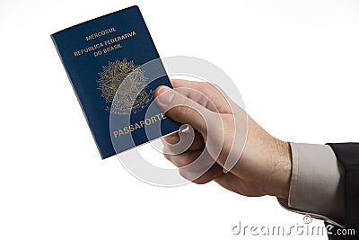 Holding a Brazilian passport. Stock Photo