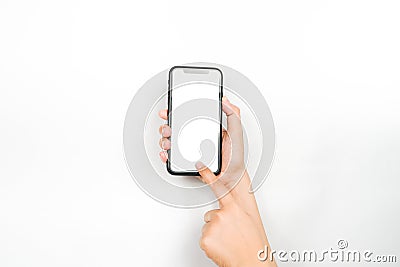 Hand holding a blank mobile phone for mockup Stock Photo