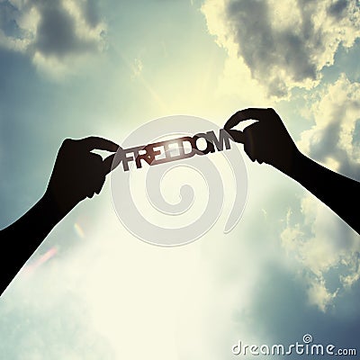 Holding a freedom Stock Photo