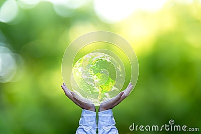 Holding a glowing earth globe in his hands. Stock Photo