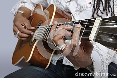 Holding a guitar chord Stock Photo