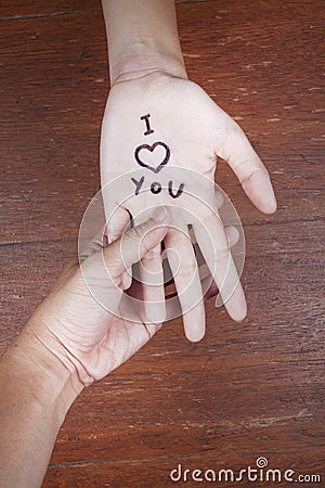 Holding hand i love you Stock Photo