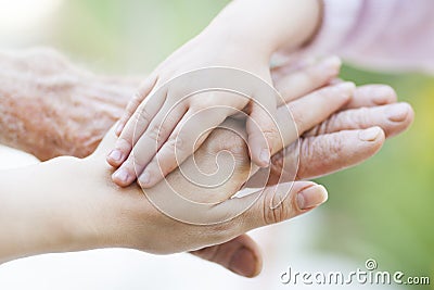 Holding Hands Stock Photo