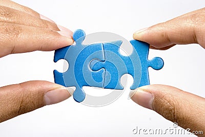 Holding Jigsaw Puzzle Stock Photo