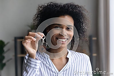 Portrait of young black female broker realty buyer holding keys Stock Photo