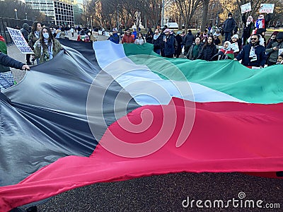 Holding the Large Palestinian Flag Editorial Stock Photo