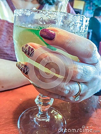 Holding Margarita Stock Photo