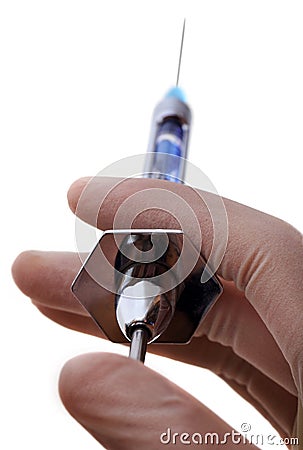 holding medical syringe Stock Photo