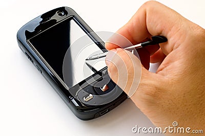Holding pda and stylus Stock Photo