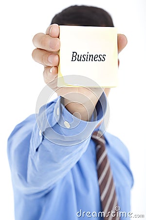 Holding post with text BUSINESS Stock Photo