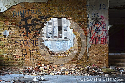 Hole in a brick wal Stock Photo