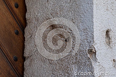 Hole carved into a stone door post where a Jewish mezuzah was once placed, Krakow, Poland Stock Photo