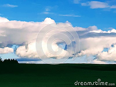 A hole in the clouds give hope for more sunshine Stock Photo