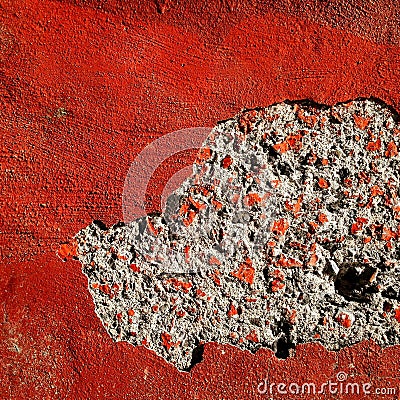 Hole in red concrete wall Stock Photo