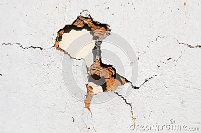 Hole in wall Stock Photo