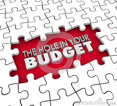 Hole in Your Budget Financial Shortfall Debt Bankruptcy Puzzle Stock Photo